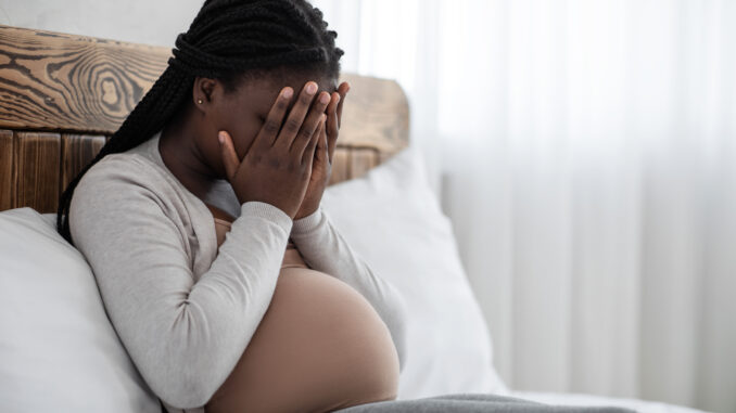 Emotional,Changes,During,Pregnancy.,Upset,Black,Pregnant,Woman,Covering,Face