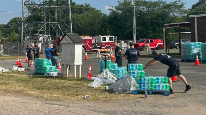 Kanapolis firefighters hand out cases of water amid E. coli boil advisory