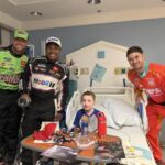Joe Gibbs Racing pit crew visits patients at Novant Health Hemby Children’s Hospital